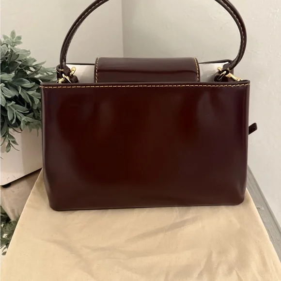 Tory Burch Britten Top Handle Patent Leather
Claret Red - Picture 3 of 8